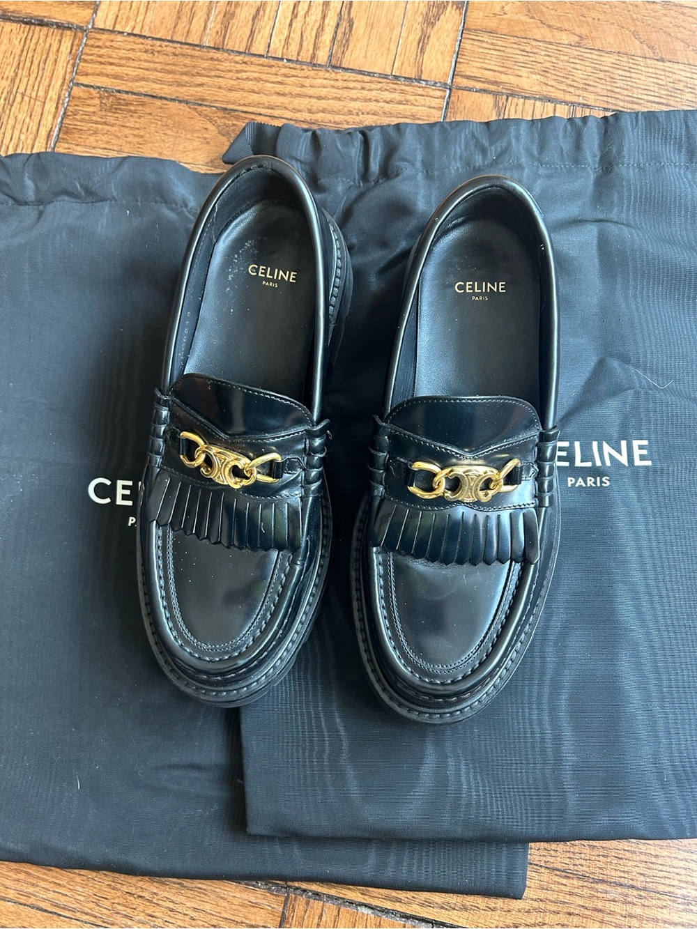 Celine Black Leather Fringe Loafers with Gold Chain Accent - Picture 1 of 9